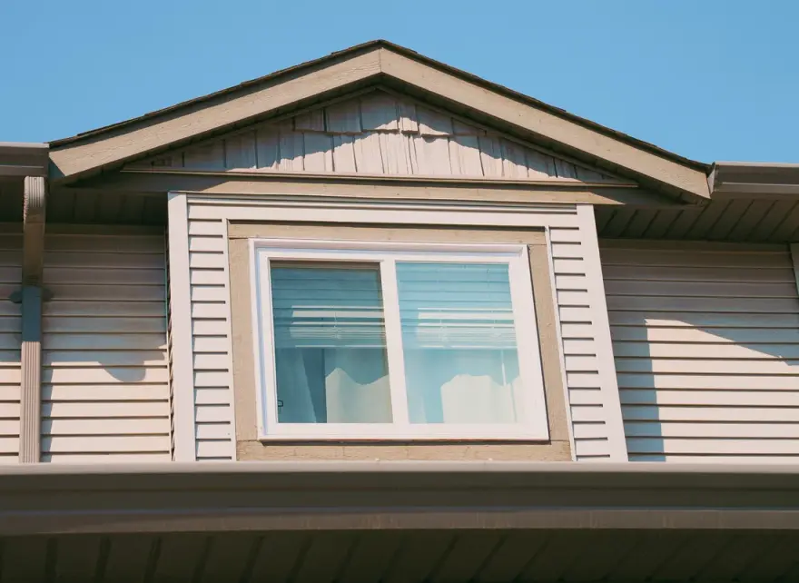 New white slider window installed on an Alberta home